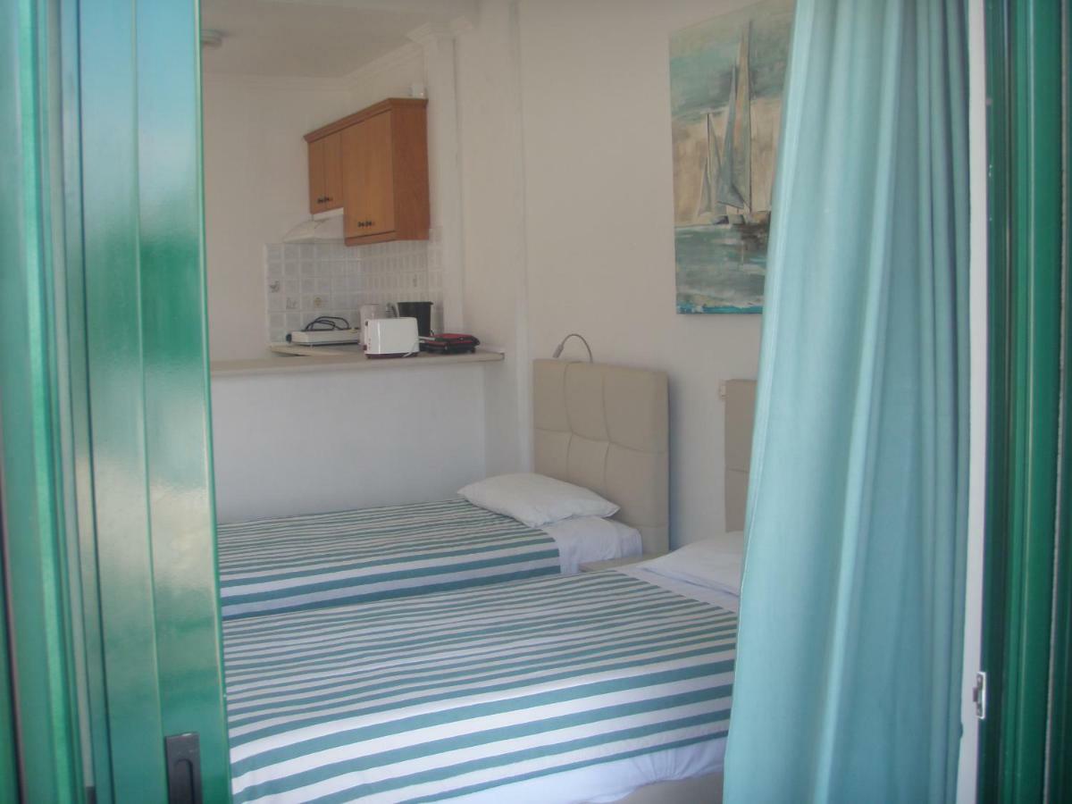 Umbrella Beach Apartments Kávos Екстериор снимка