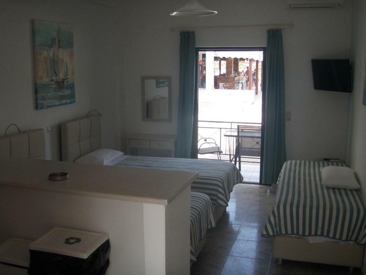 Umbrella Beach Apartments Kávos Екстериор снимка